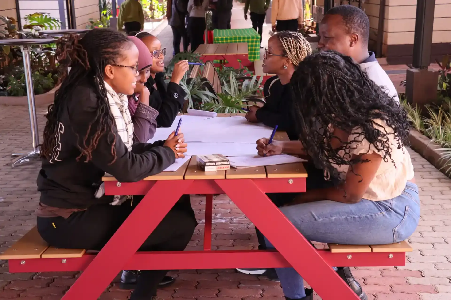 Women studying together outdoors